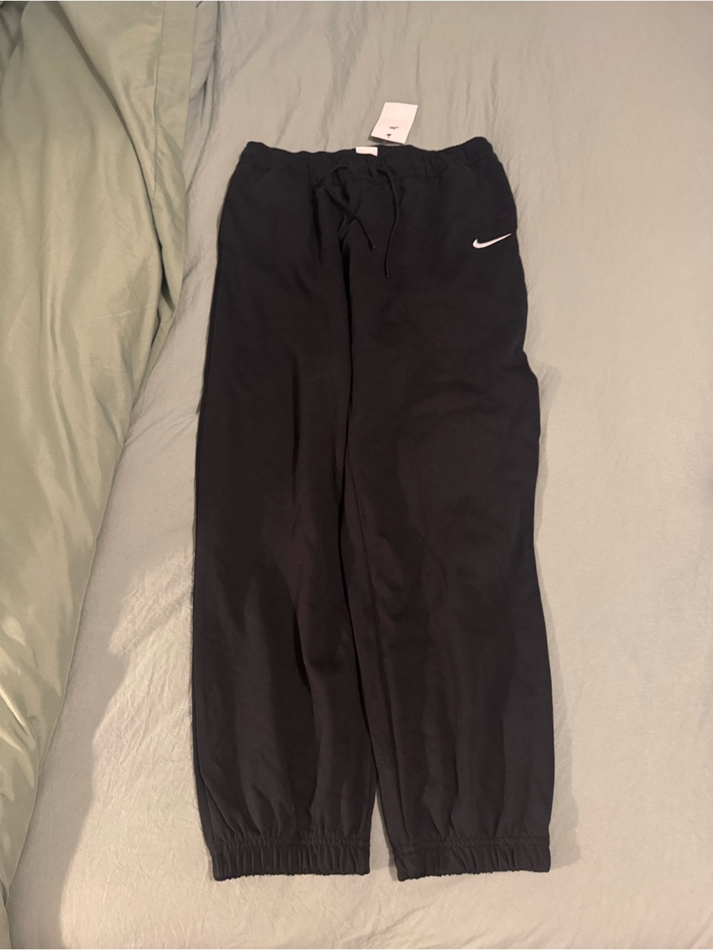 Nike Kids Black Joggers with White Swoosh